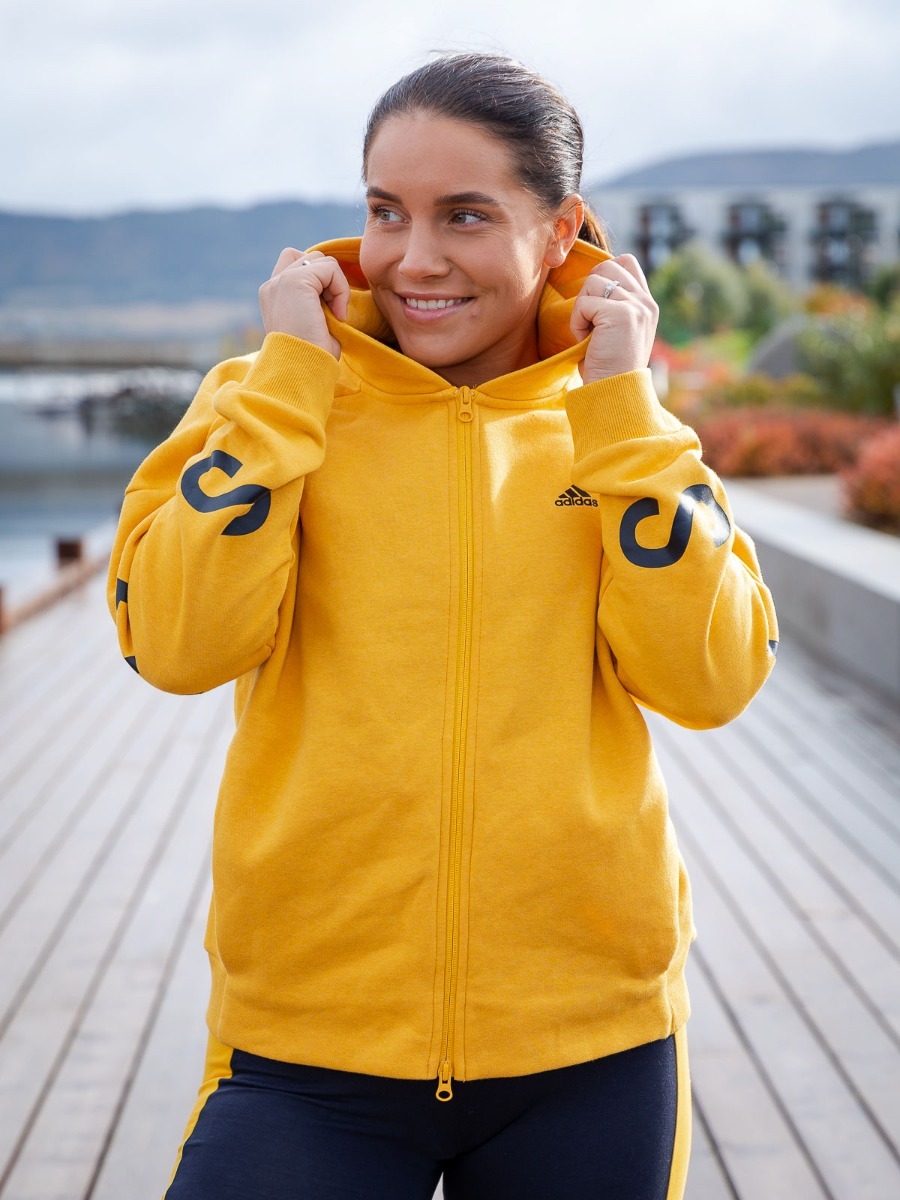 adidas W S2S SWT FZHD Active gold