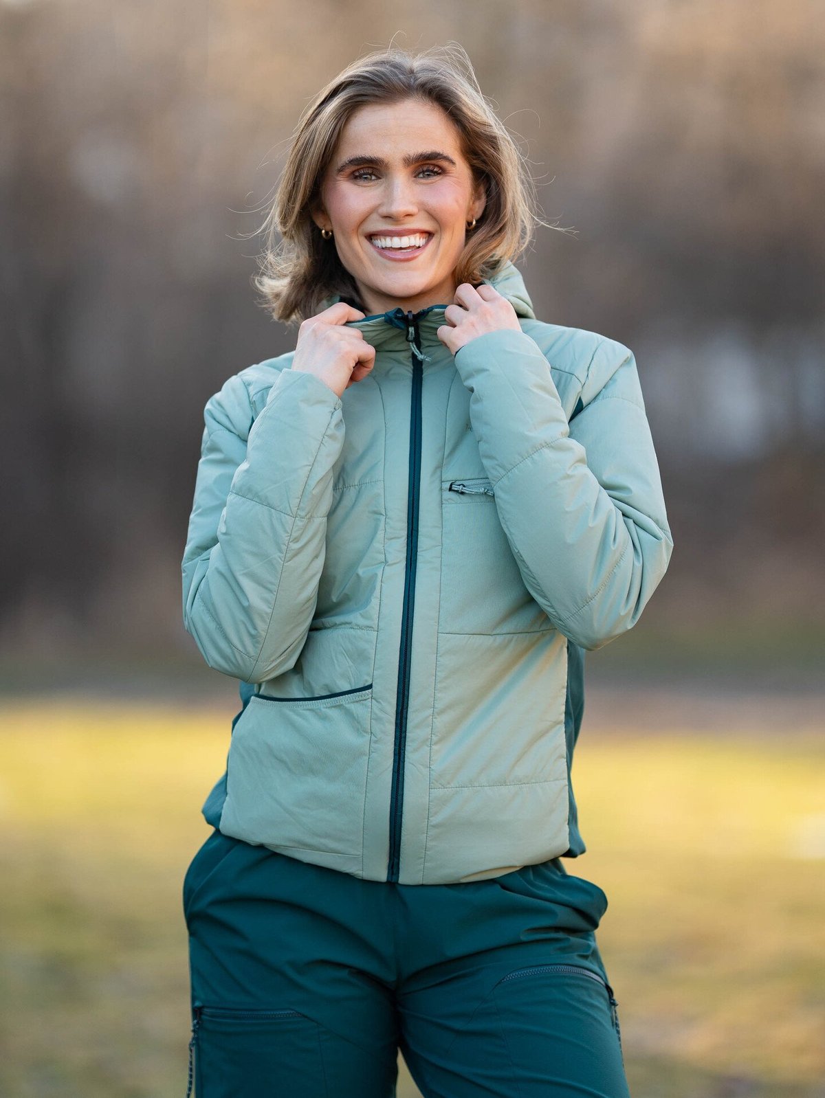 Peak Performance Freelight Reversible Insulated Hood Jacket Women Ponderosa Pine / Green Valley