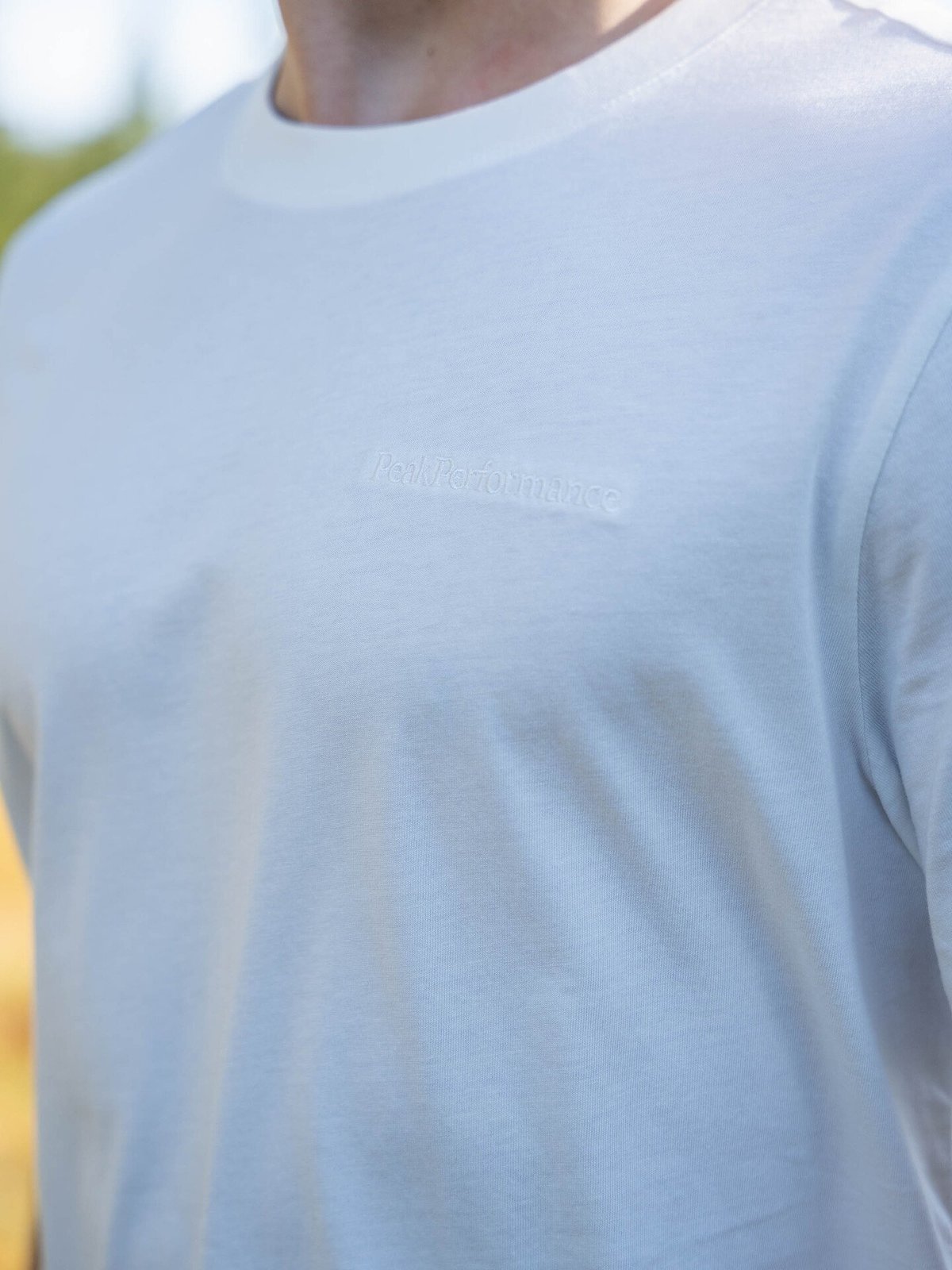 Peak Performance M Original Small Logo Tee OFFWHITE