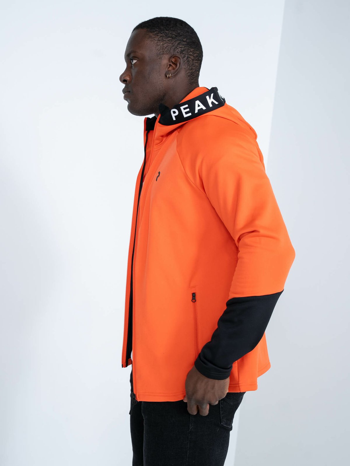 Peak Performance Rider Mid Zip Hood Orange adventure / black