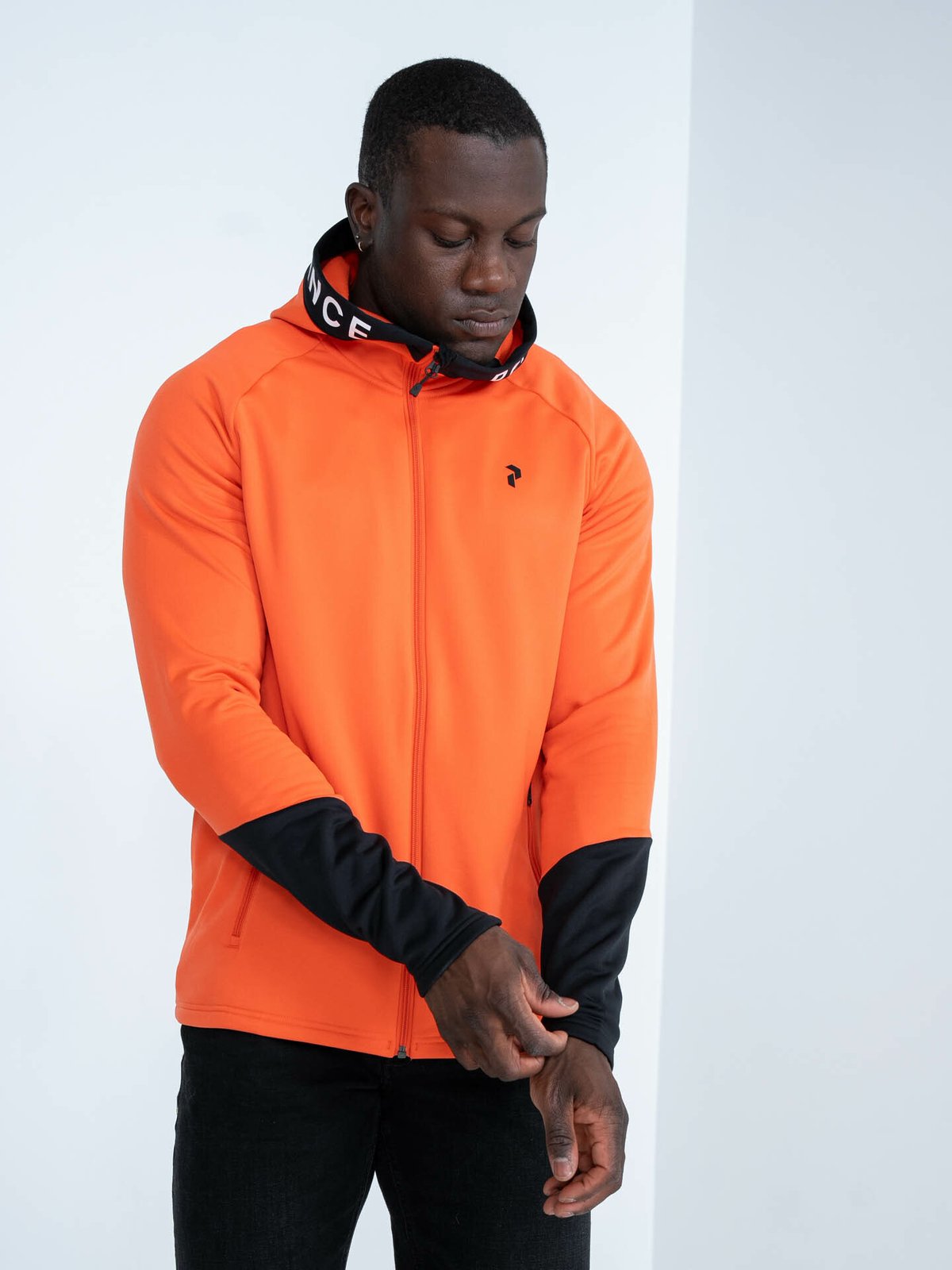 Peak Performance Rider Mid Zip Hood Orange adventure / black