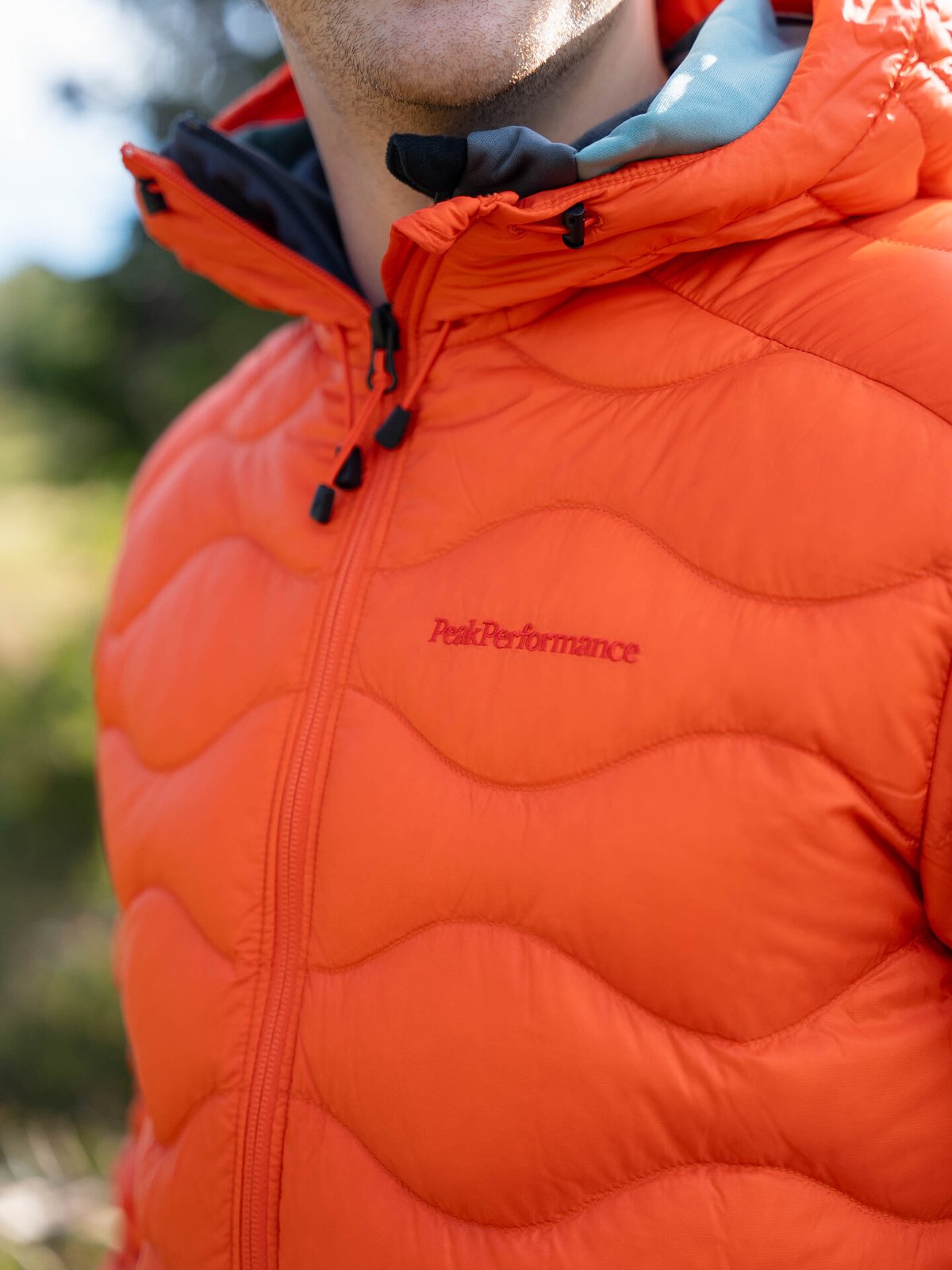 Peak Performance Helium Down Hood Jacket Men Solar Burst