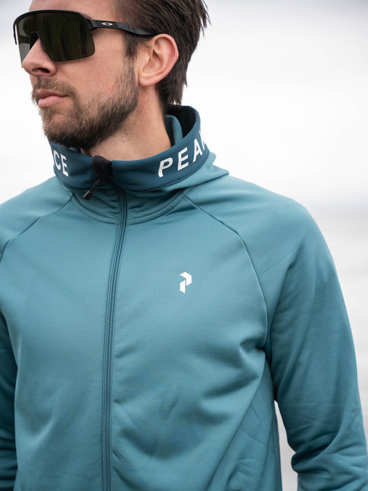 Peak Performance Rider Zip Hood Hydro Fresh / Infinity Teel