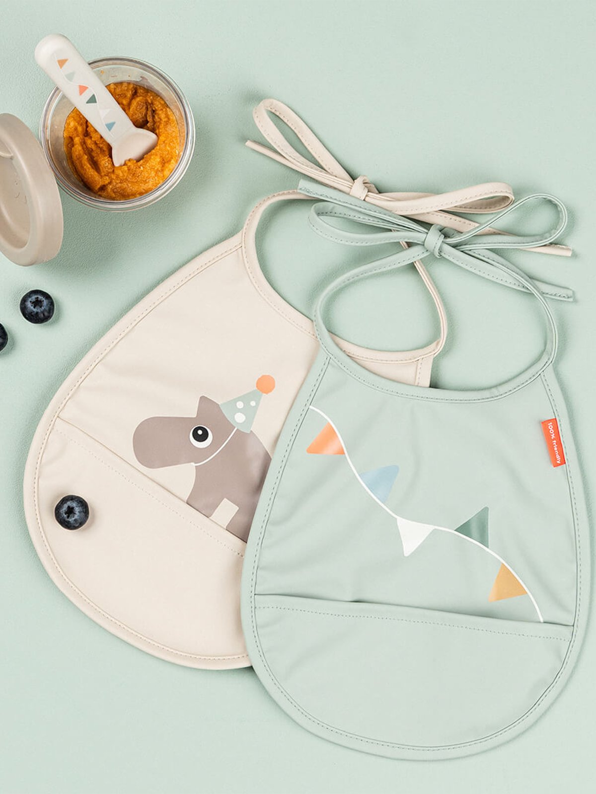 Done by Deer Tiny pocket bib 2-pack Celebration Sand