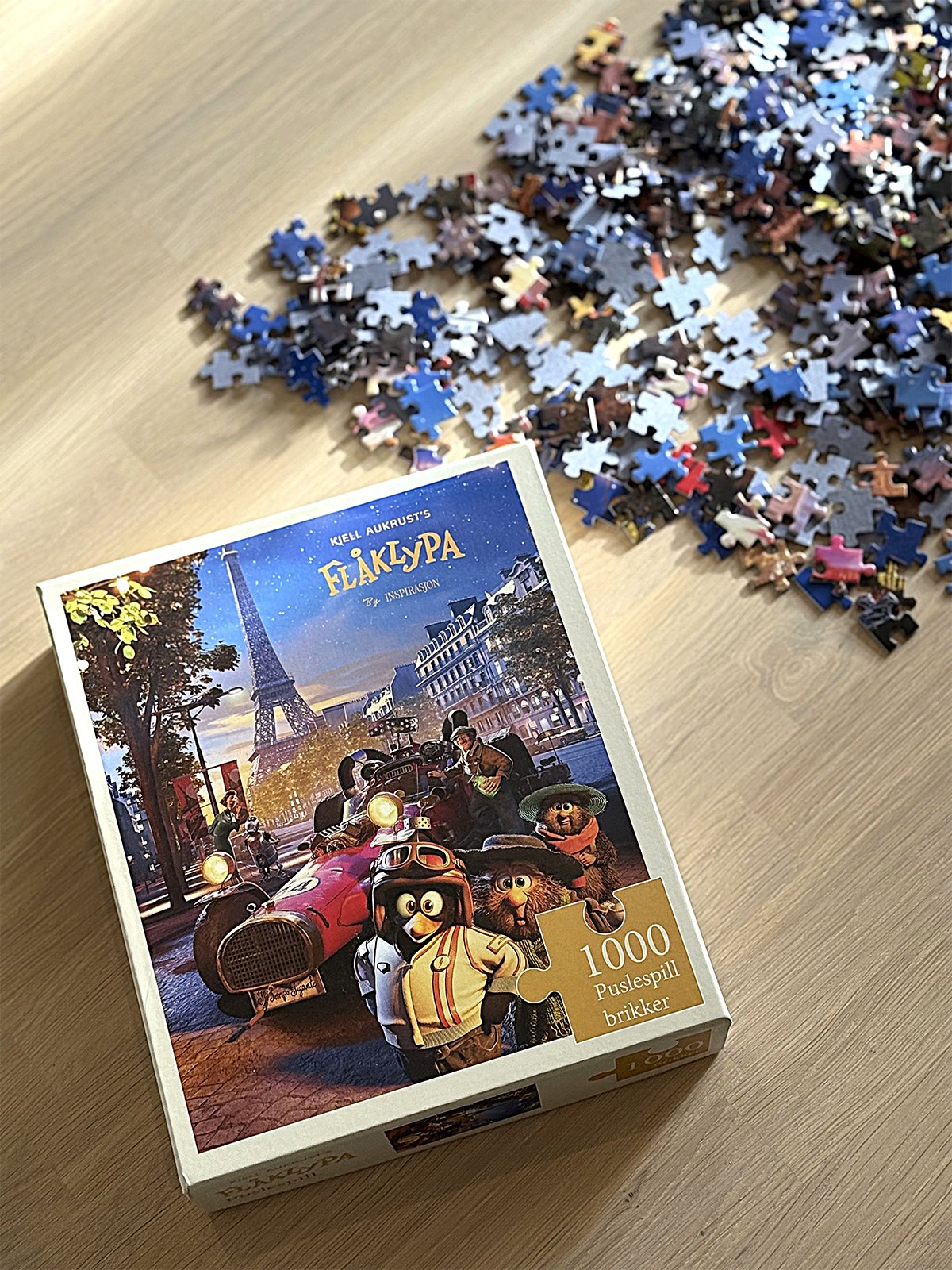 Flåklypa Puslespill 1000 - Fra Paris til Pyramidene Flerfarget