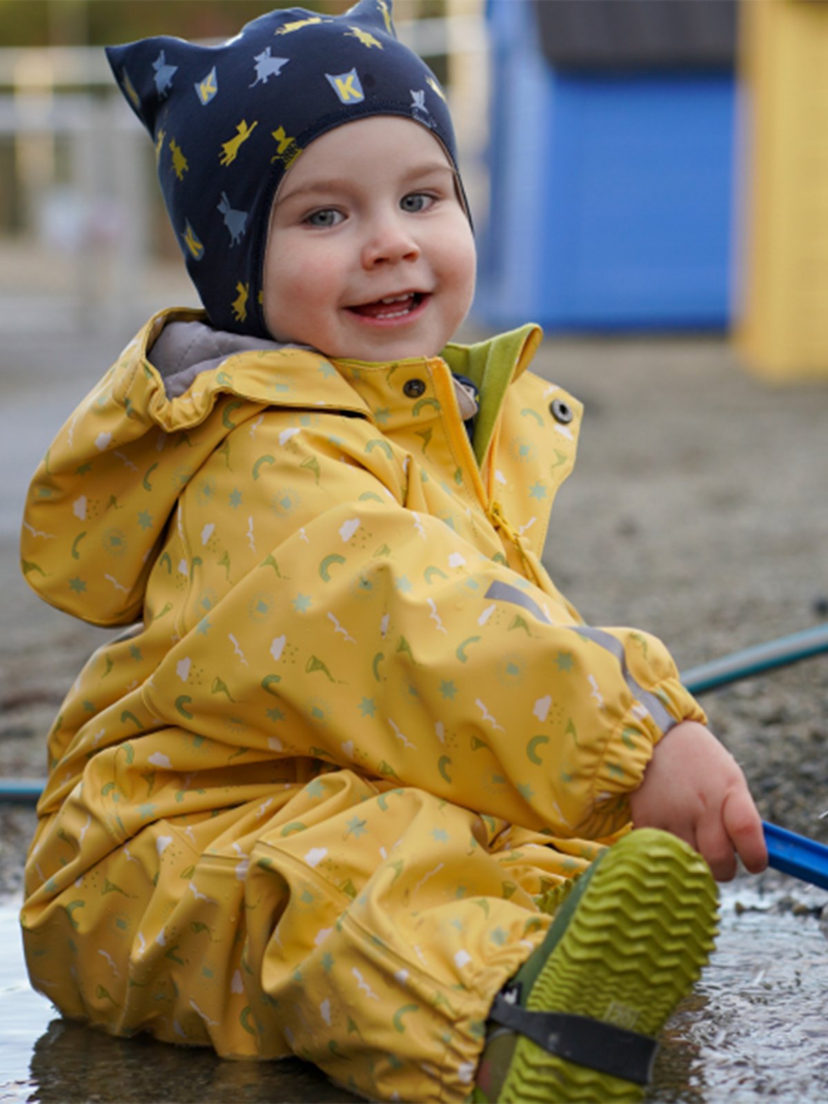 Kattnakken Babyregndress Dugg Bananskum