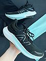 New Balance Fuel Cell Propel Black with pale blue